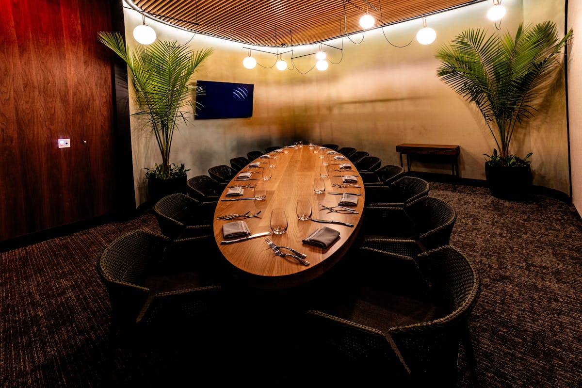 a room that has a clock on a table