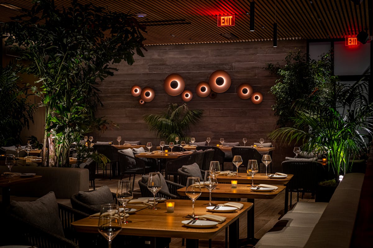 a group of people sitting at a table